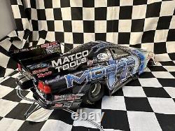 2003 1/16 NHRA Whit Bazemore Mopar Funny Car 1/1250 translates to:
 <br/>
 


<br/>
2003 1/16 NHRA Whit Bazemore Mopar Funny Car 1/1250