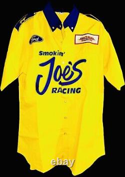 NHRA Jim Head CAMEL Top Fuel NITRO Drag Racing SMOKIN JOES Dragster CREW Shirt
<br/>
  <br/>Translation: Chemise d'équipage pour l'équipe NHRA Jim Head CAMEL Top Fuel NITRO Drag Racing SMOKIN JOES Dragster