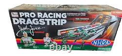 NHRA John Force Pro Racing Drag strip Electric Slot Car 13ft+ 6 Funny Cars RARE  	
<br/>
  <br/> 
	 Translation: NHRA John Force Pro Racing Drag strip Voiture électrique Slot Car 13ft+ 6 Funny Cars RARE